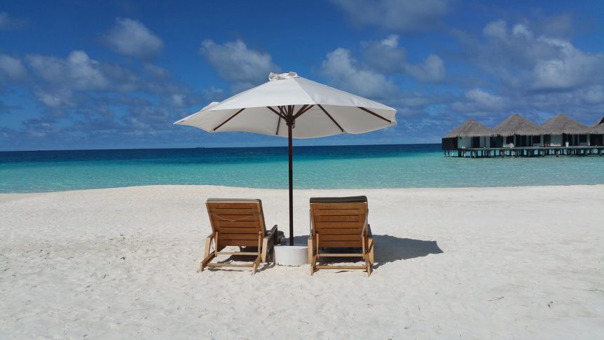 Vakantie Malediven strand zee strandstoelen
