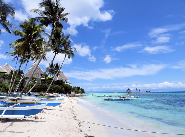Reizen Filipijnen strand boten zee